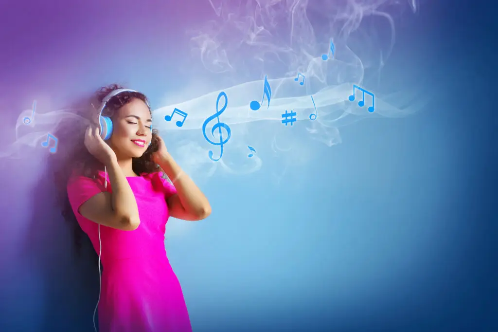 Woman listening to headphones with music notes art flowing in the background
