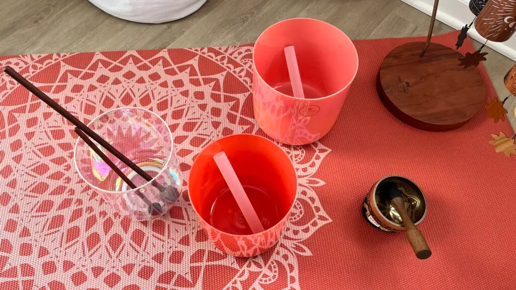 Crystal singing bowls orange and pink