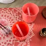 Crystal singing bowls orange and pink